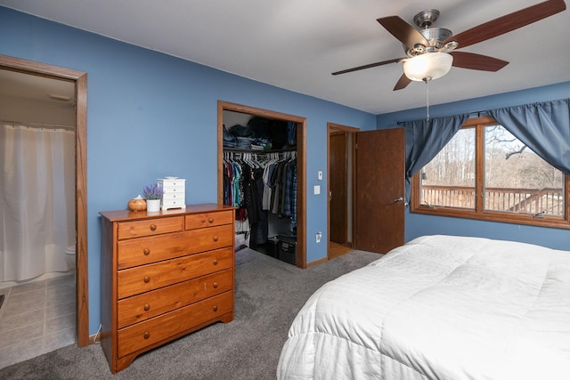 bedroom with ceiling fan, baseboards, and carpet