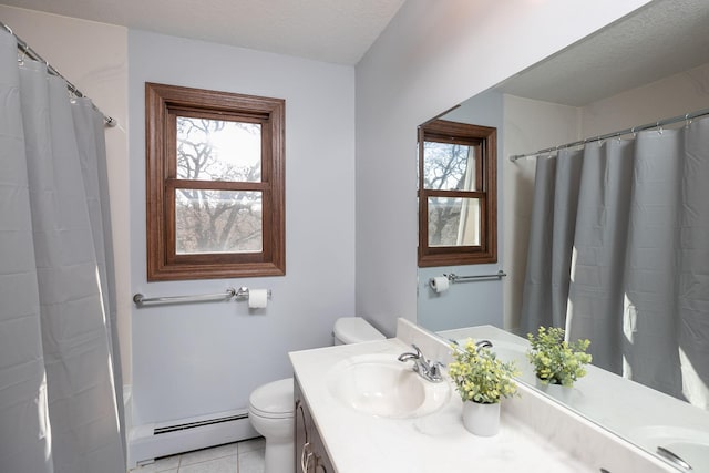 bathroom with vanity, a textured ceiling, a baseboard heating unit, tile patterned floors, and toilet