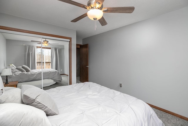 809 60th Ave SW, Rochester, MN 55902 - carpeted bedroom featuring a closet, baseboards, and ceiling fan