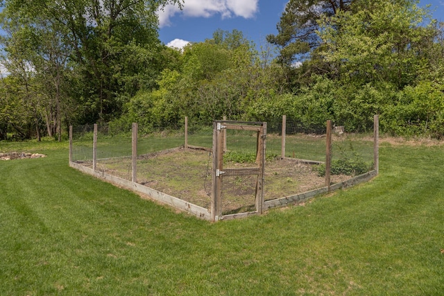 809 60th Ave SW, Rochester, MN 55902 - view of grassy yard featuring a garden