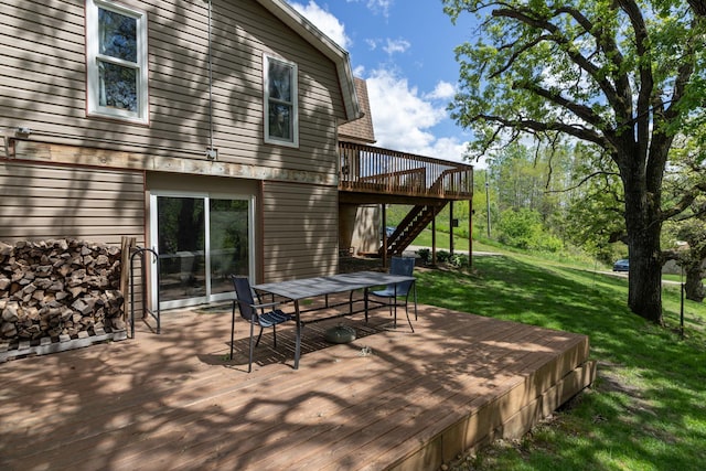 809 60th Ave SW, Rochester, MN 55902 - wooden terrace featuring a lawn, outdoor dining space, and stairway