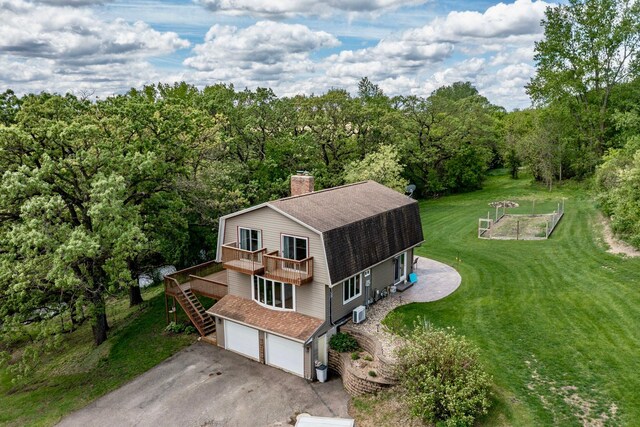 809 60th Ave SW, Rochester, MN 55902 - aerial view of property and surrounding area with a heavily wooded area