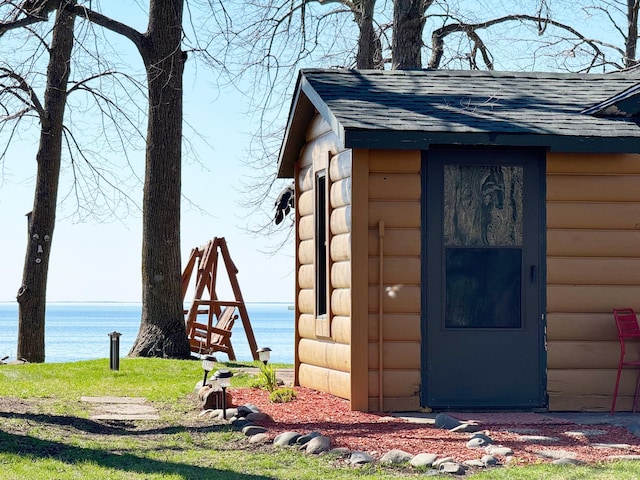 20455 326th Ave, Isle, MN 56342 - view of outdoor structure featuring a water view and an outbuilding