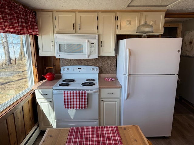 20455 326th Ave, Isle, MN 56342 - kitchen featuring wood finished floors, white appliances, light countertops, and white cabinets