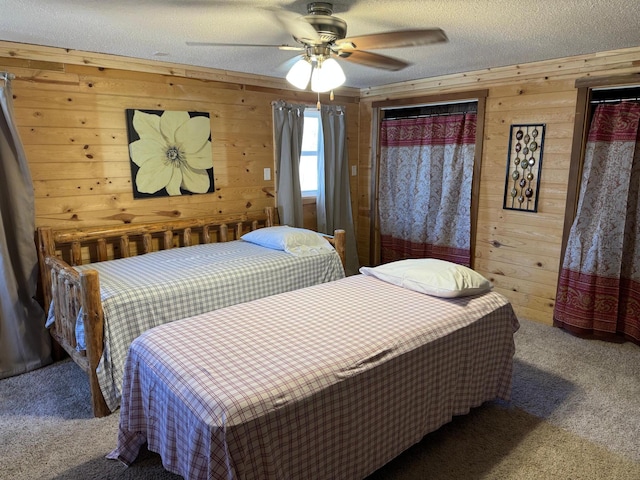 20455 326th Ave, Isle, MN 56342 - bedroom with wooden walls, a textured ceiling, carpet floors, and a ceiling fan