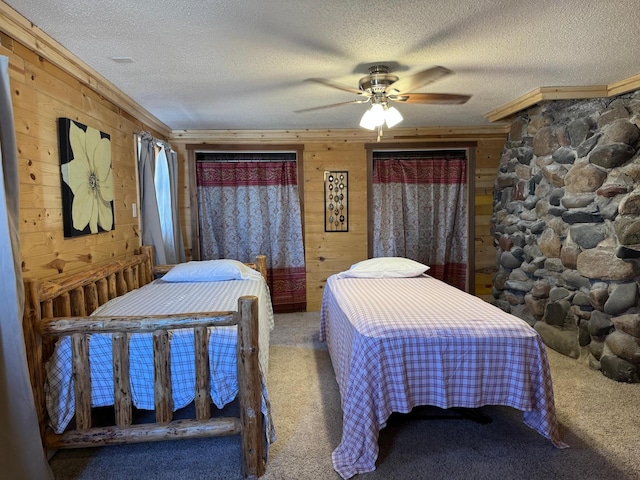 20455 326th Ave, Isle, MN 56342 - bedroom featuring carpet, a textured ceiling, and wood walls