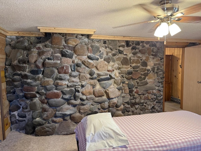 20455 326th Ave, Isle, MN 56342 - carpeted bedroom featuring ceiling fan, a textured ceiling, and wooden walls