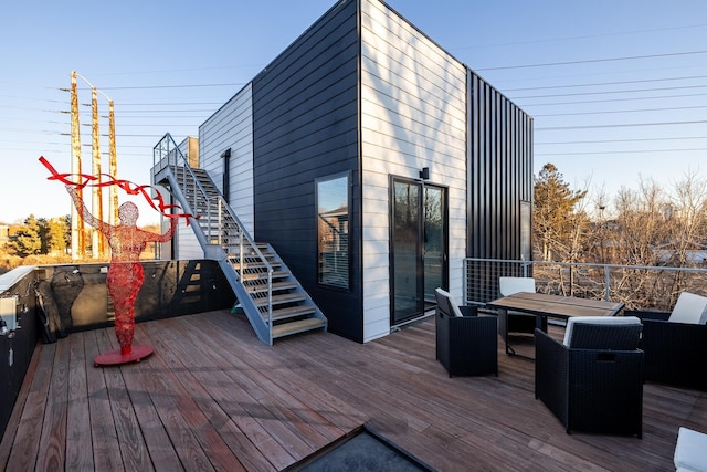 wooden terrace featuring stairway