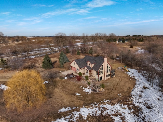 snowy aerial view with a rural view