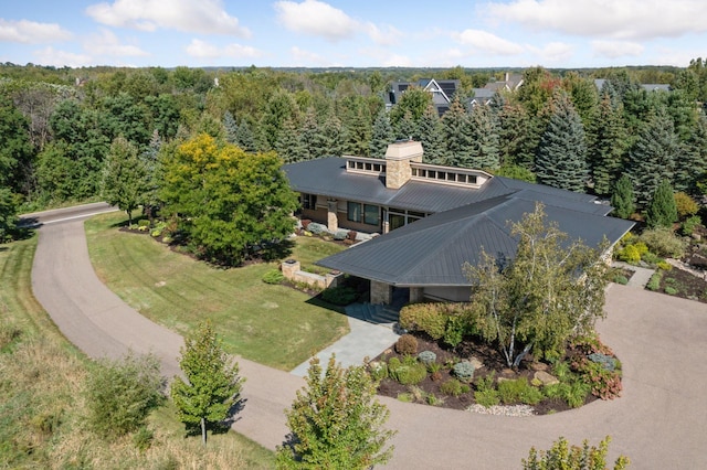 aerial view with a wooded view