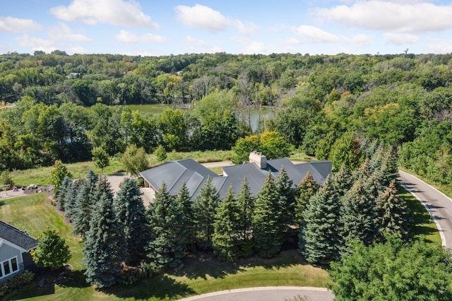 bird's eye view featuring a forest view