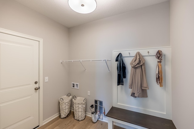 9176 62nd St S, Cottage Grove, MN 55016 - washroom with hookup for a washing machine and wood finished floors