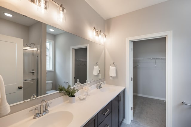 9176 62nd St S, Cottage Grove, MN 55016 - full bath with double vanity, a stall shower, and a spacious closet