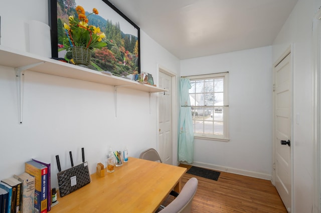 office featuring wood finished floors and baseboards