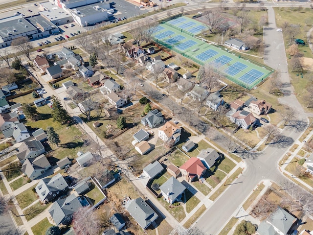 birds eye view of property with a residential view