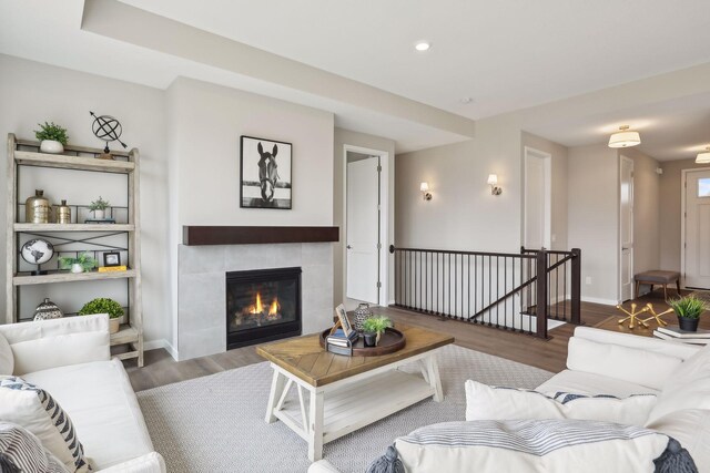 9184 62nd St S, Cottage Grove, MN 55016 - living area featuring wood finished floors, a fireplace, and recessed lighting
