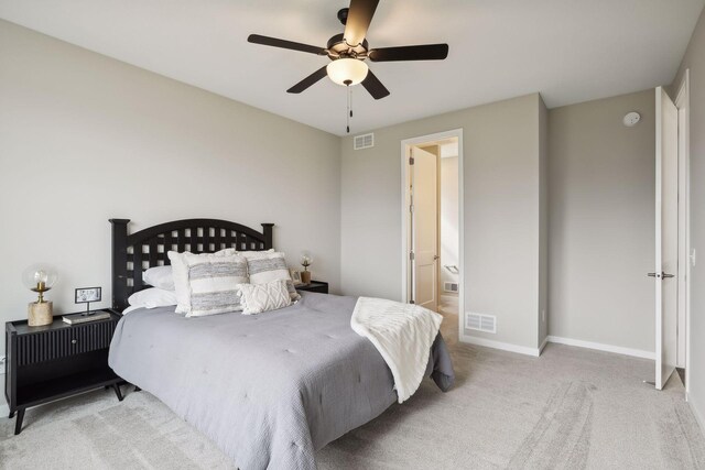 9184 62nd St S, Cottage Grove, MN 55016 - carpeted bedroom featuring a ceiling fan and connected bathroom