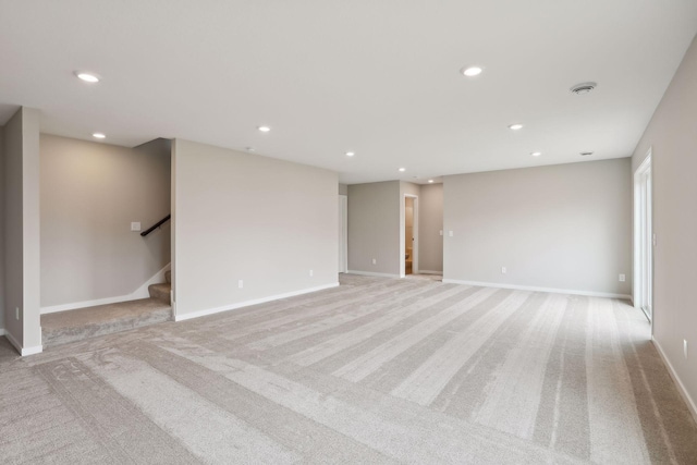 9184 62nd St S, Cottage Grove, MN 55016 - empty room featuring light carpet, recessed lighting, and stairs