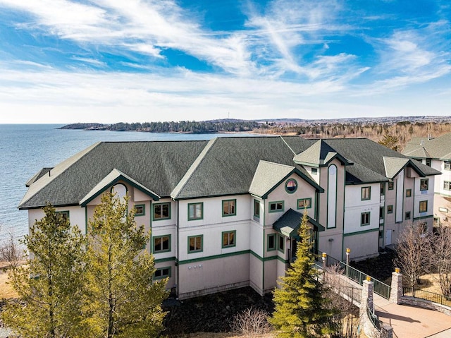 aerial view with a water view and a residential view