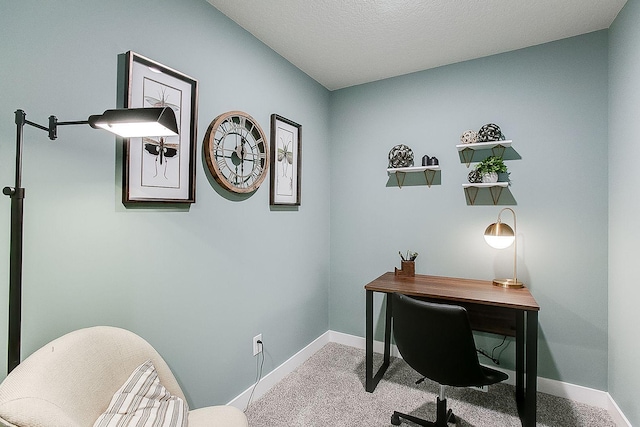 home office featuring baseboards and carpet floors