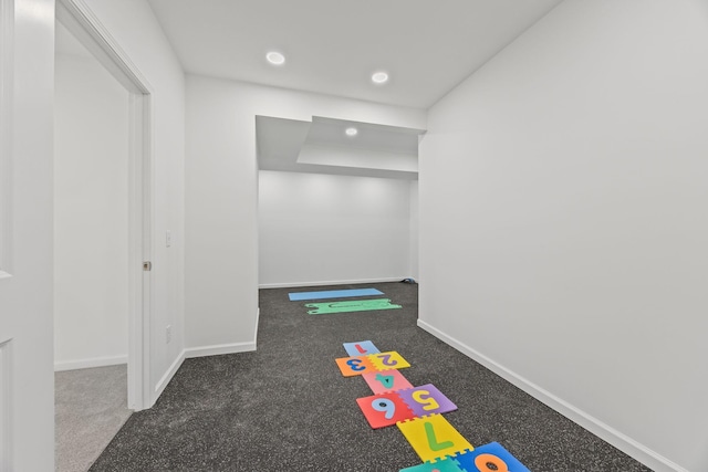 game room with recessed lighting and baseboards