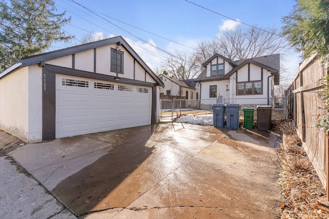 detached garage with fence