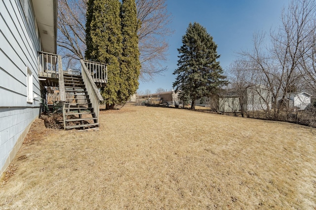 view of yard featuring stairway