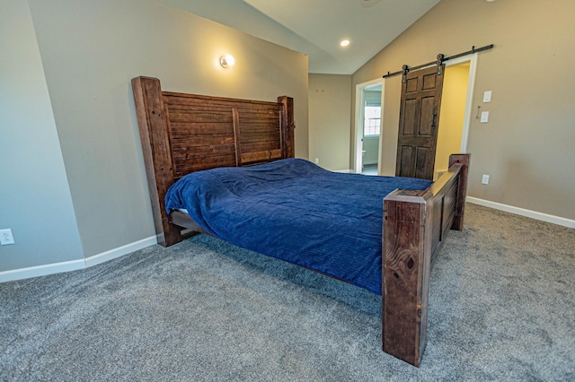 bedroom featuring carpet flooring, baseboards, lofted ceiling, and a barn door