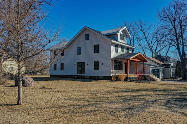 exterior space with a front yard and a porch