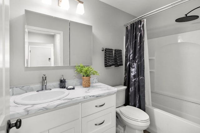 full bath featuring toilet, shower / bath combo, and vanity