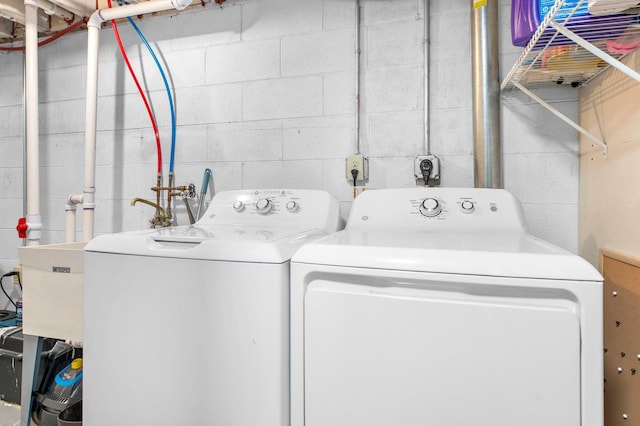 laundry room featuring laundry area and washer and clothes dryer