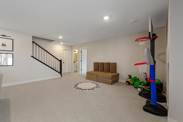 sitting room with recessed lighting, stairway, baseboards, and carpet flooring