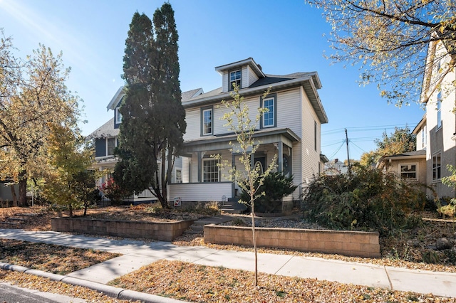 view of american foursquare style home