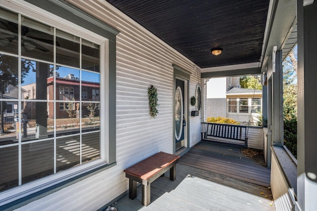 wooden terrace featuring a porch