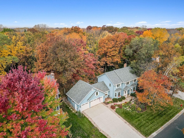 aerial view featuring a forest view