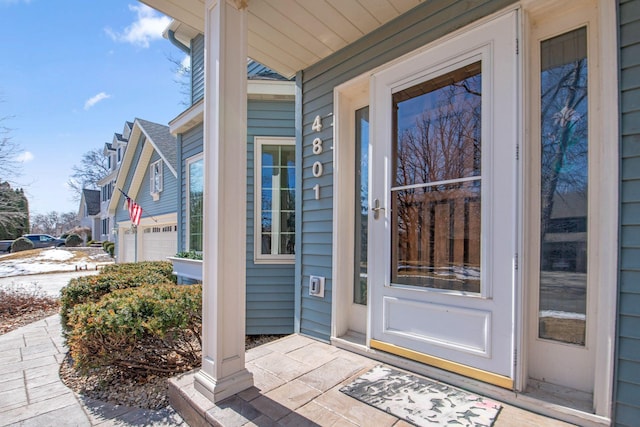 entrance to property with covered porch