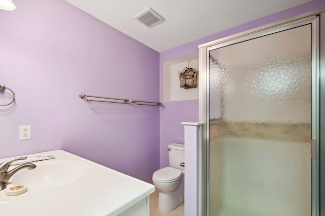 full bath featuring visible vents, a sink, a shower stall, tile patterned floors, and toilet