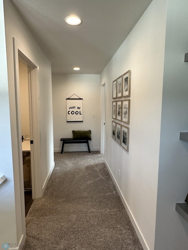 hall with recessed lighting, baseboards, and carpet floors