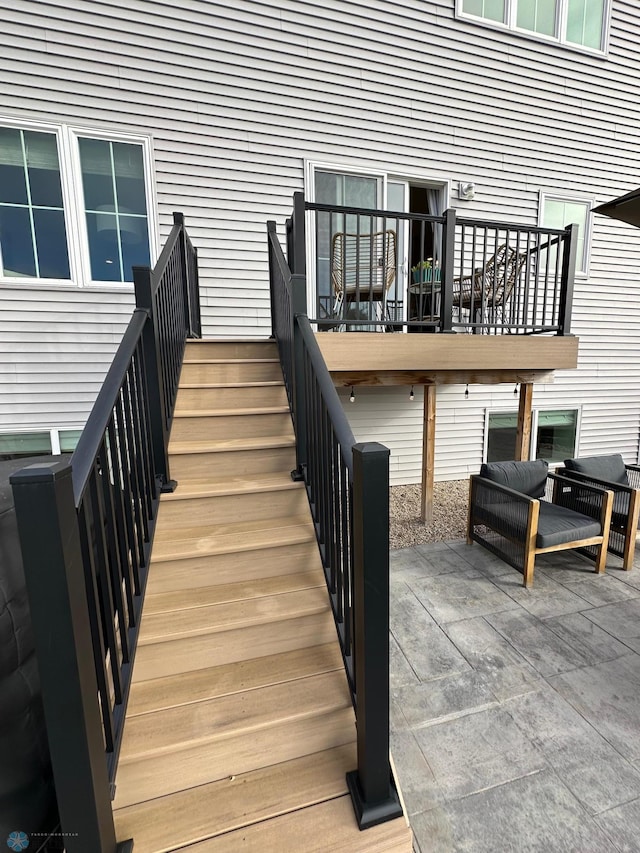 wooden deck featuring a patio area