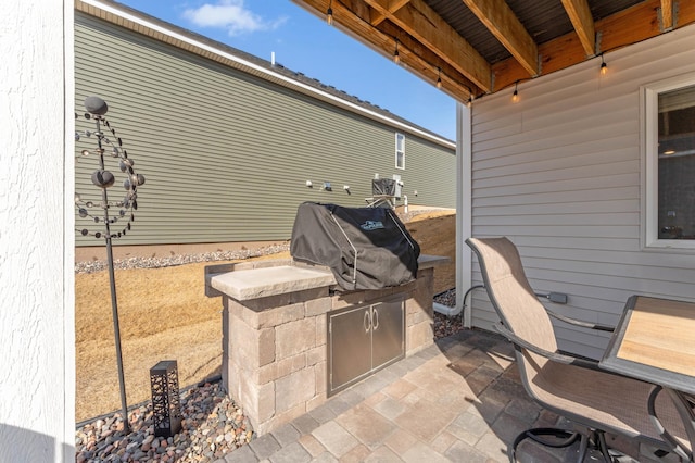 view of patio with exterior kitchen