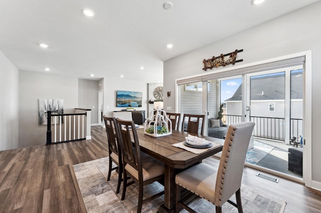 dining room featuring recessed lighting, wood finished floors, and visible vents