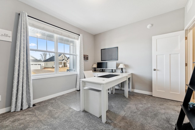 carpeted office with baseboards