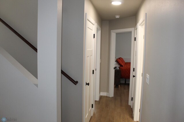 hallway with light wood finished floors