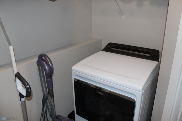 laundry room with washer / dryer and laundry area