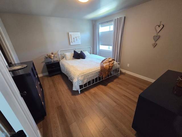 6746 Joseph St, Horace, ND 58047 - bedroom with wood finished floors and baseboards