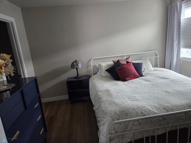 6746 Joseph St, Horace, ND 58047 - bedroom featuring dark wood-style floors and baseboards