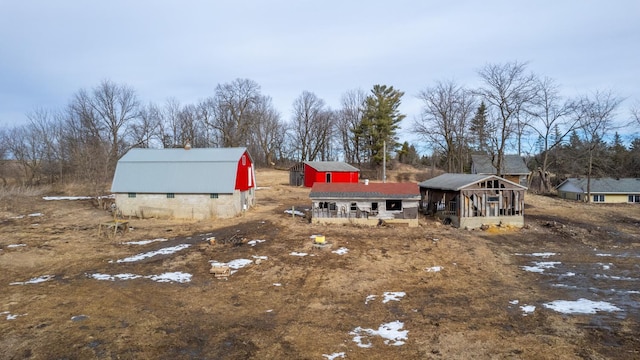 view of yard featuring a barn and an outdoor structure