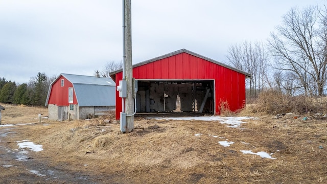 view of outbuilding featuring an outdoor structure