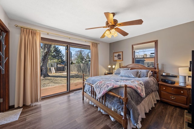 bedroom with dark wood finished floors, access to outside, and ceiling fan