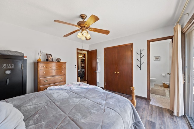 bedroom with a ceiling fan, wood finished floors, baseboards, a closet, and ensuite bathroom